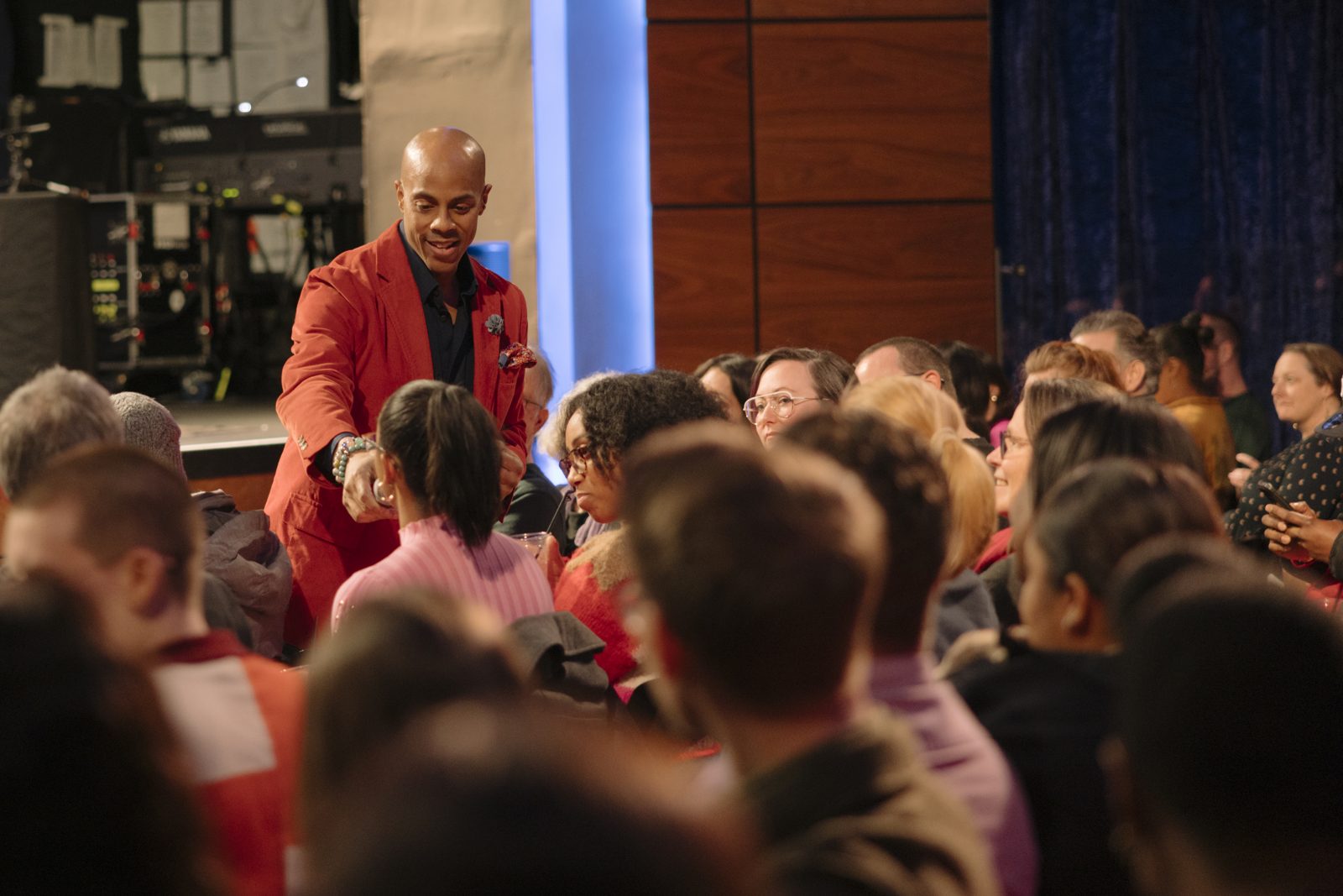 An audience fully engaged during a live storytelling showcase